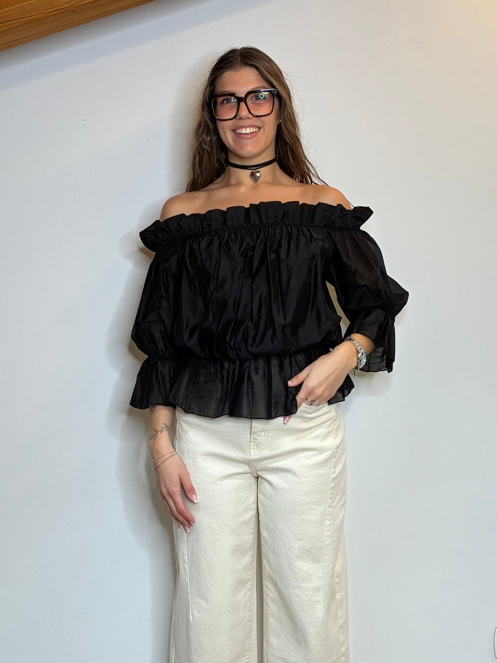 Blusa con rouches nera