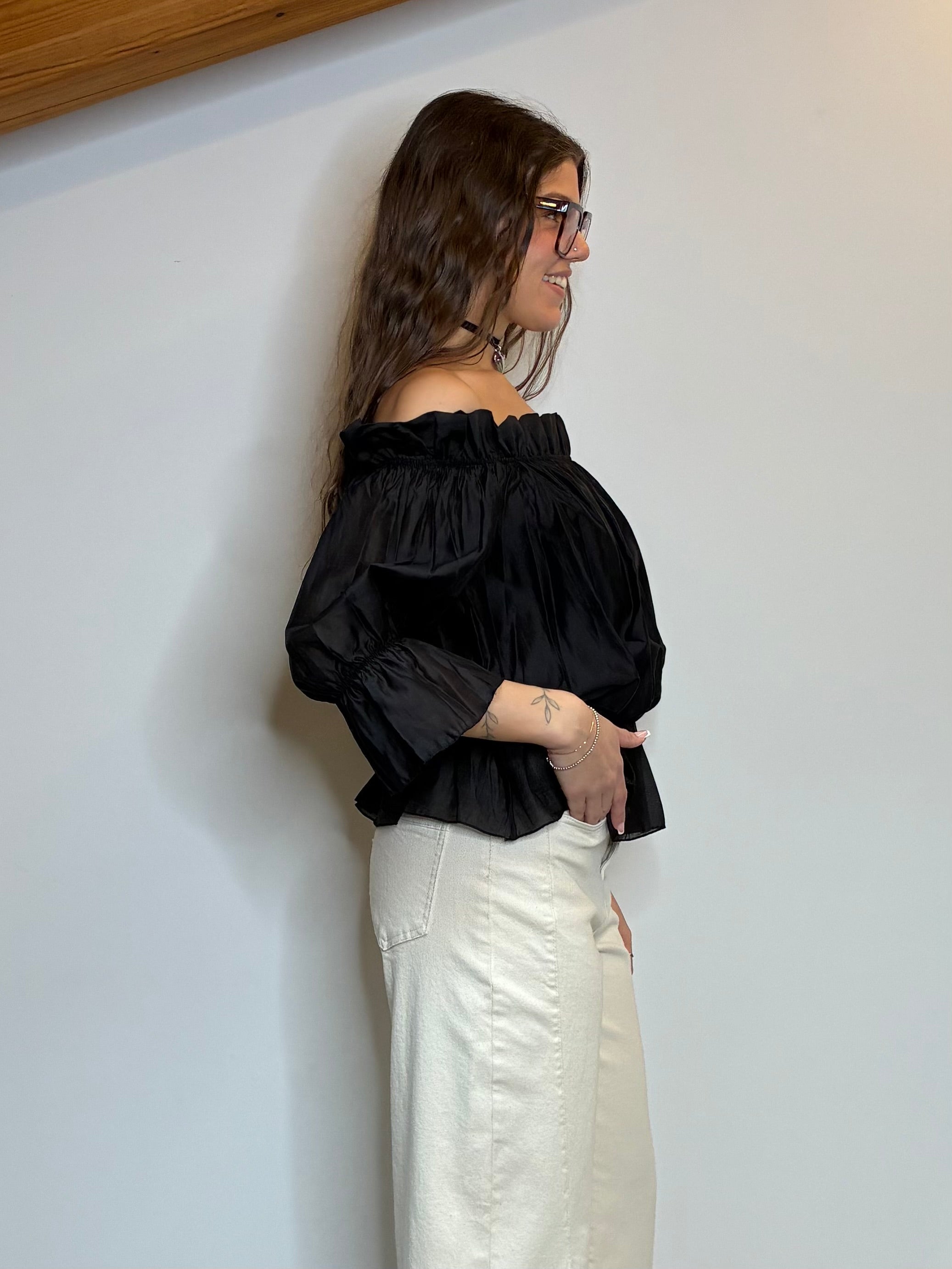 Blusa con rouches nera