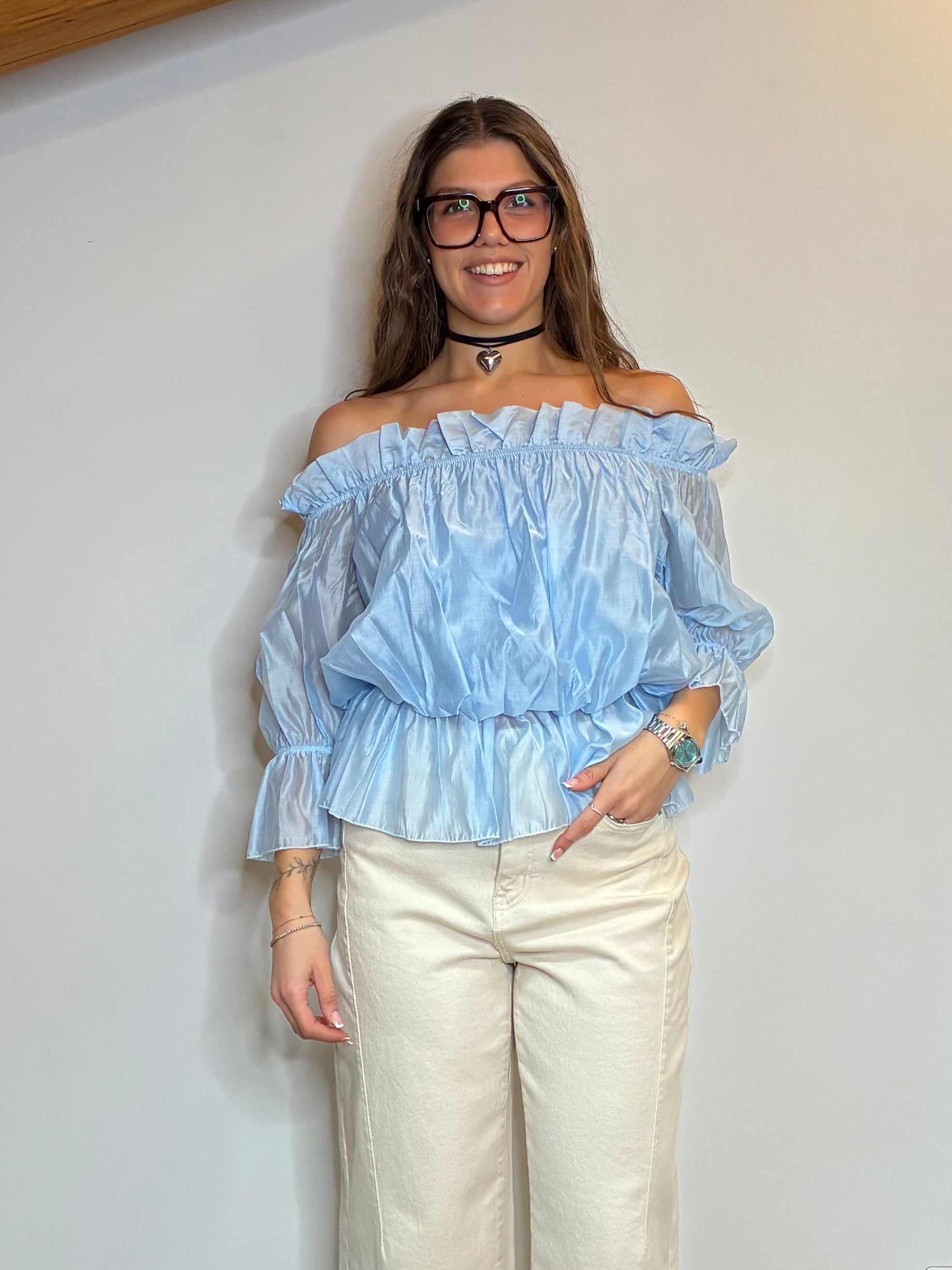 Blusa con rouches azzurra