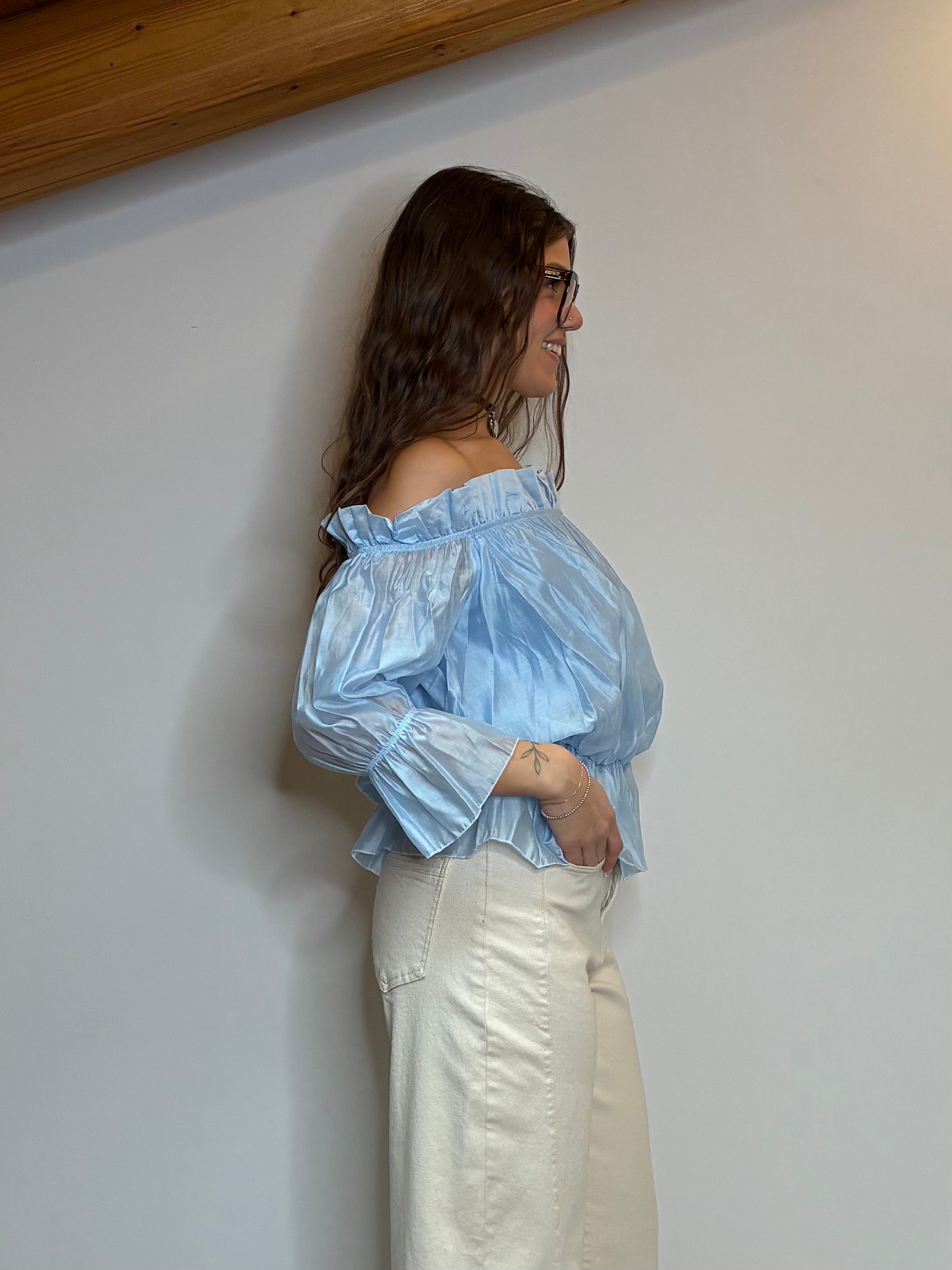 Blusa con rouches azzurra