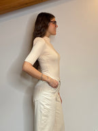 Body con spalline imbottite nude